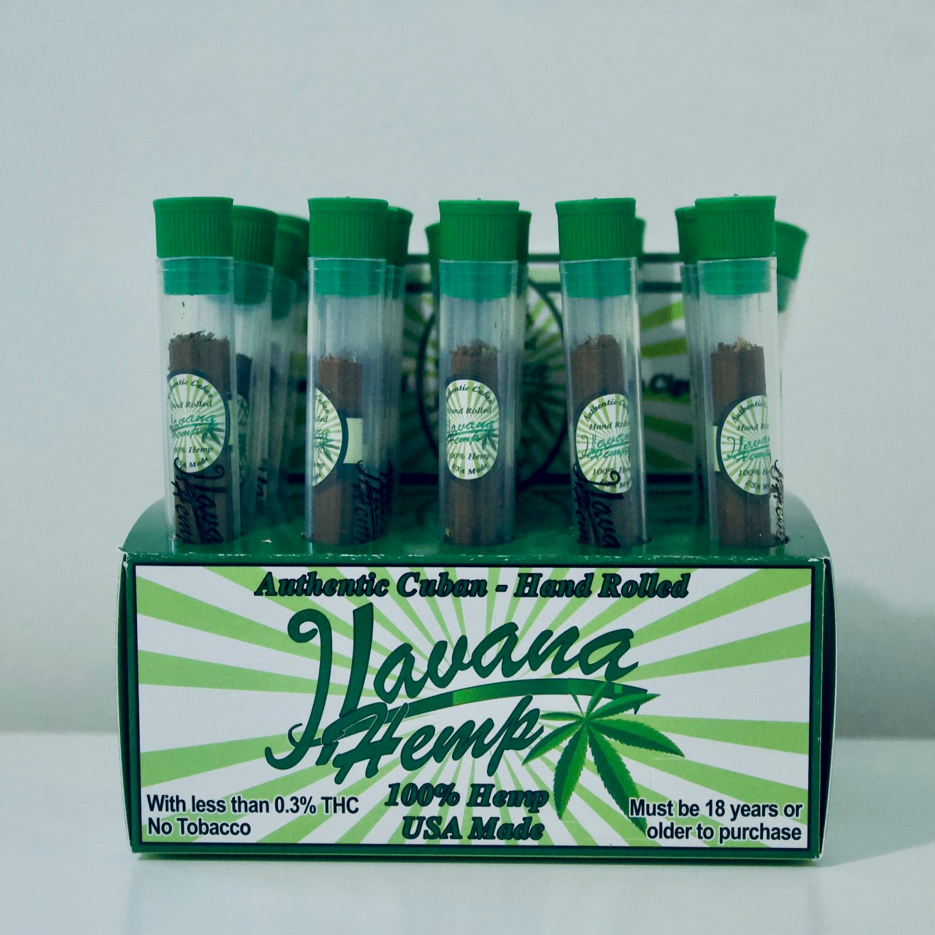 Hemp Cigarella Cigar with wooden tip  and hemp wrap rolled in Little Havana Miami by seasoned cigar rollers. Packaged in a clear reusable waterproof and smell proof tube.  No tobacco!